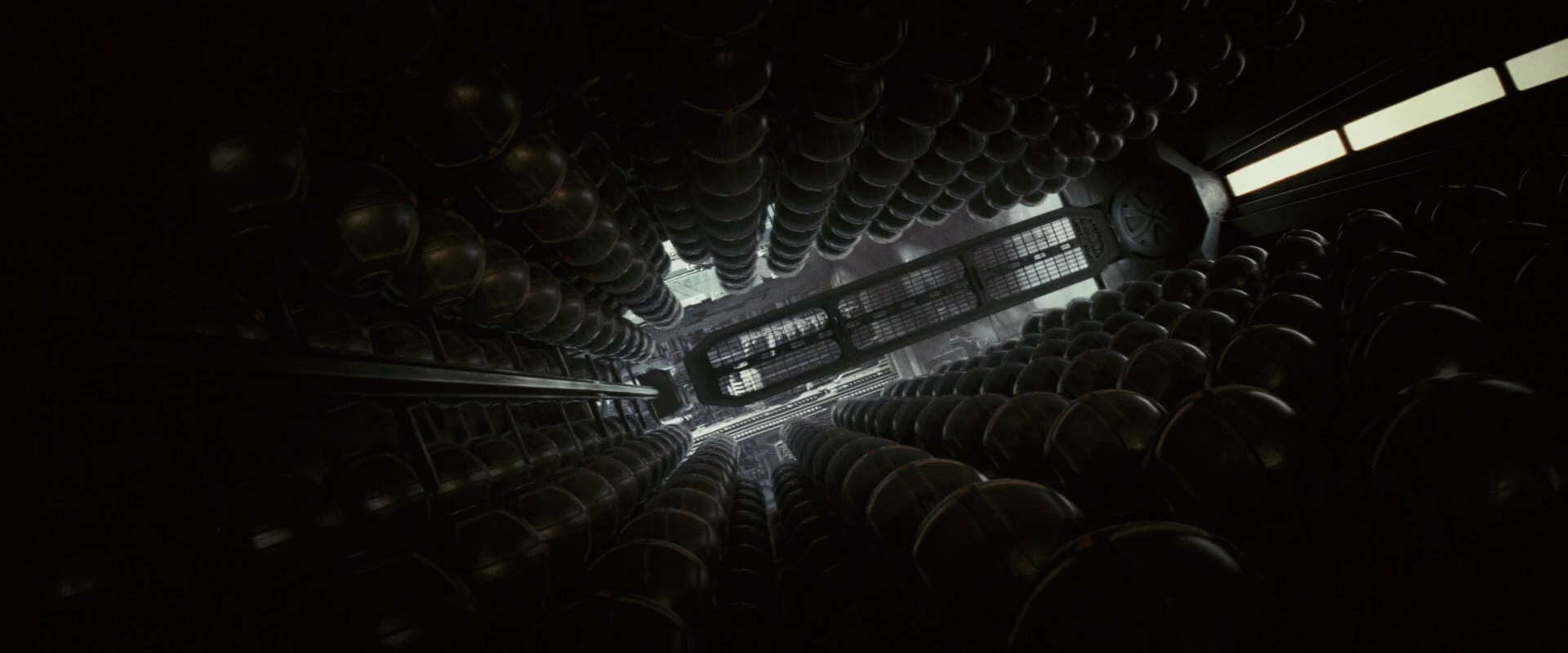 An array of bombs lined up into vertical stacks, with a catwalk-ish platform in the center.